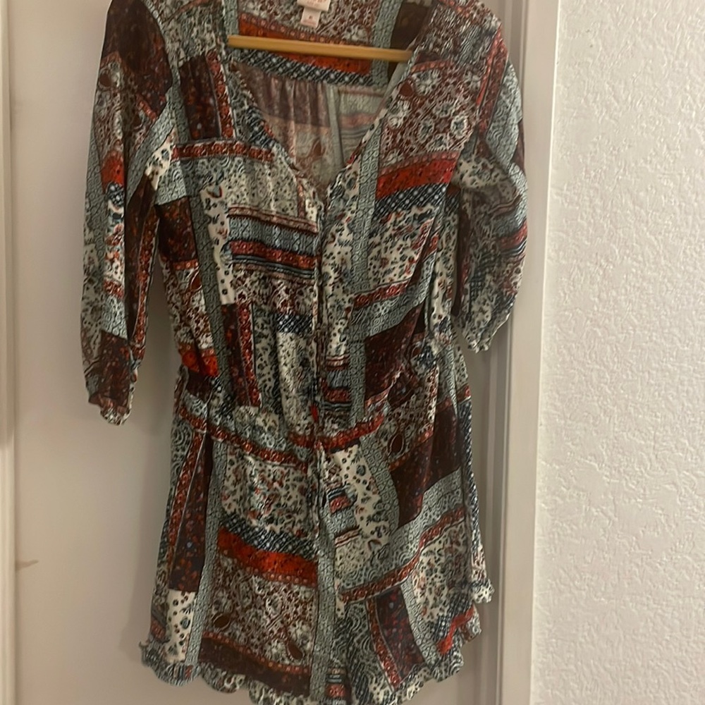 Adorable ruffle edge romper